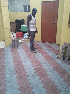 Brick paving and tar surfacing