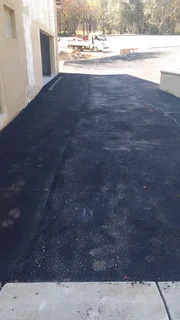 Tar surfacing and tennis courts