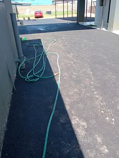 Tar surfacing and tennis courts