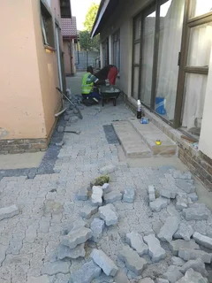 Brick paving and tar surfacing