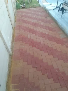 Brick paving and tar surfacing