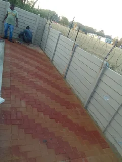 Brick paving and tar surfacing