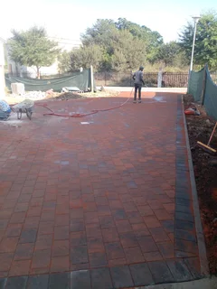 Brick paving and tar surfacing