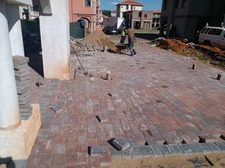 Brick paving and tar surfacing