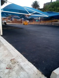 Brick paving and tar surfacing