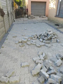 Brick paving and tar surfacing