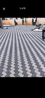 Brick paving and tar surfacing