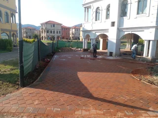 Brick paving and tar surfacing