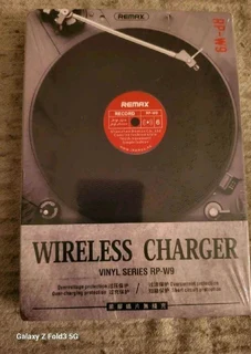 remax vinyl wireless charger with over night protector