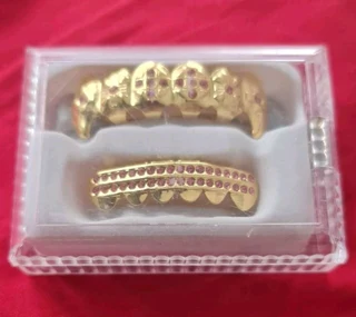 Grilz set colorful Gold  rhinestone fangs except the black & white ones