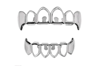 Grilz full set hollow fangs gold color or silver