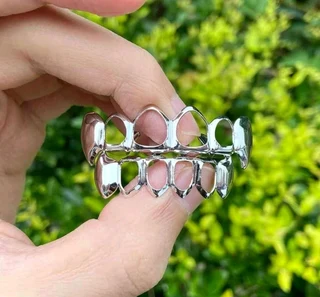 Grilz full set hollow fangs gold color or silver