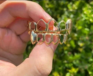 Grilz full set hollow fangs gold color or silver