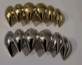 Grilz vampire fangs gold and silver top only