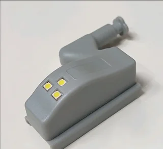 cabinet hinge LED light, designed to illuminate the inside of cabinets when opened