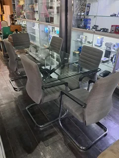 Glass table with 6 chairs  R7500