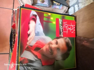 Lps stack of different artist all in its own c9vers