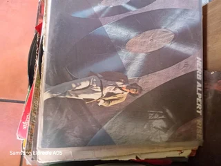 Lps stack of different artist all in its own c9vers