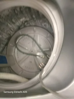 Silver metallic 16kg Whirlpool Toploader washing machine