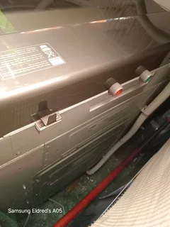 Silver metallic 16kg Whirlpool Toploader washing machine