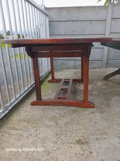 Deck table in mahogany freshly varnished