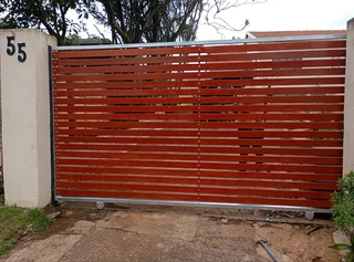 Balau wood driveway gates and balustrades