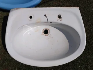 Used basin, needs thorough cleaning