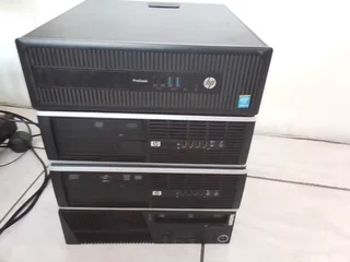Four HP computer boxes