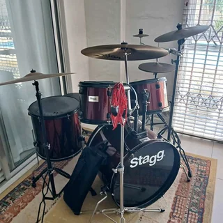 Stagg Drums, Zildjian K Series Cymbals, Practice Pads, Evans Heads In Excellent Condition.