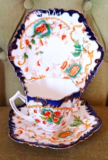 Vintage Tea Sets in Imbuia Display Cabinet