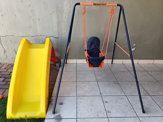 Toddlers swing and slide