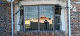 Aluminium trellis and steel burglars, gates