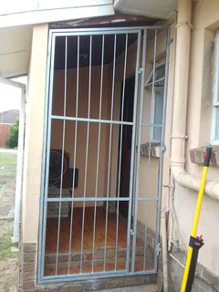 Aluminium trellis and steel burglars, gates