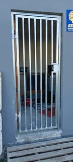 Aluminium trellis and steel burglars, gates