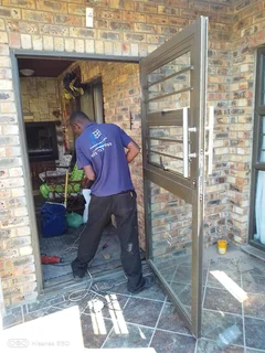 Aluminum doors, sliding windows, trelli burglars, stacker doors