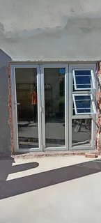 Aluminum doors, sliding windows, trelli burglars, stacker doors