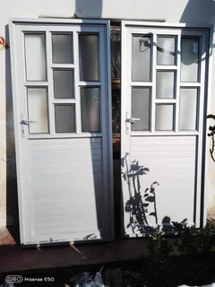 Aluminum doors, sliding windows, trelli burglars, stacker doors
