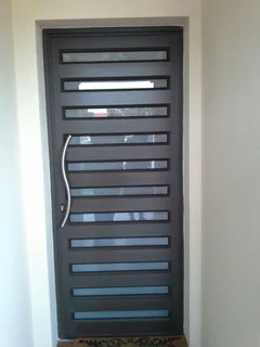 Aluminum doors, sliding windows, trelli burglars, stacker doors