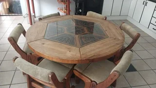 Wooden round table with glass top & 6 chairs