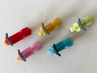 Lot no. 1 of five LEGO compatible scooters