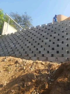Retainer wall installation