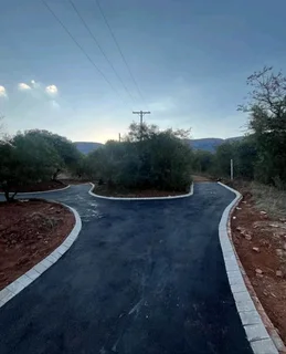 Tar Driveways, Retaining Wall, Concrete And Carports