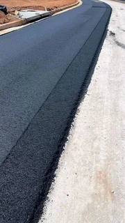 Smooth Asphalt tar driveways, resurfacing, patches, speed humps and more