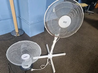 Old standing and table fan