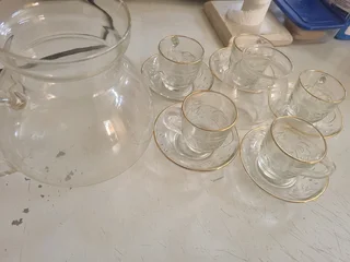 Glass tea cup with saucer