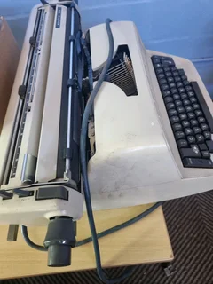 Electric type writer