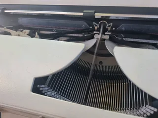 Electric type writer
