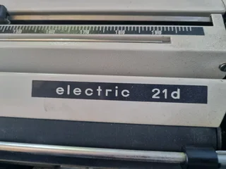 Electric type writer