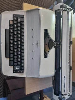 Electric type writer