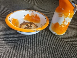 Enamel old basin and jug